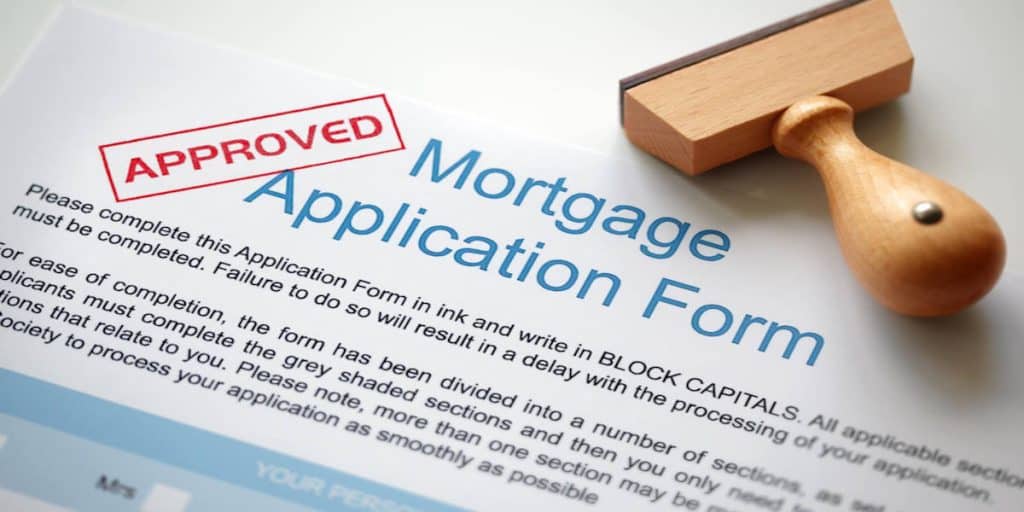 Approved Mortgage loan application with rubber stamp
