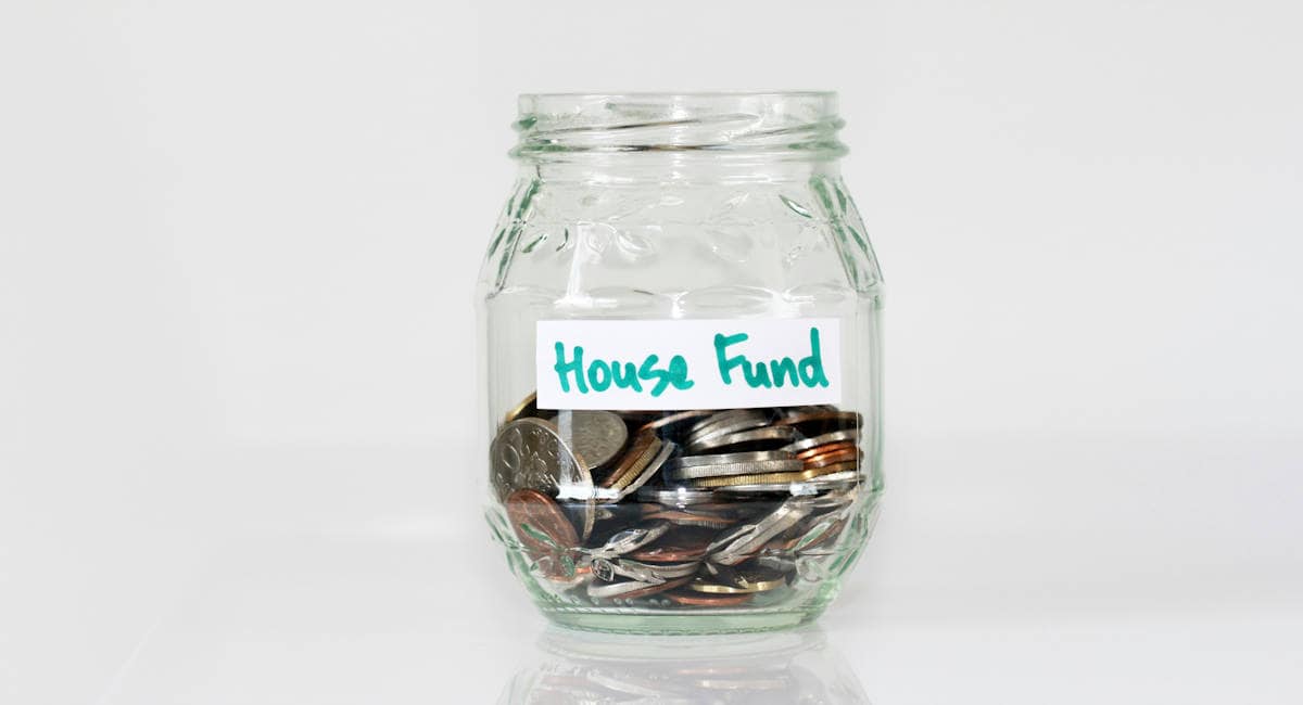 Jar with money saving for a first house